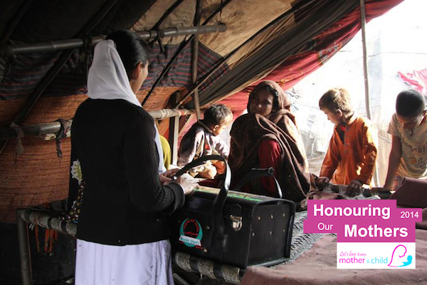 Photo: A midwife is paying a visit to a pregnant woman who is a mother of four in the suburbs of Lahore, Pakistan, as part of the awareness initiatives Muslim Charity teams implement to give better understanding to mothers on maternal health issues.